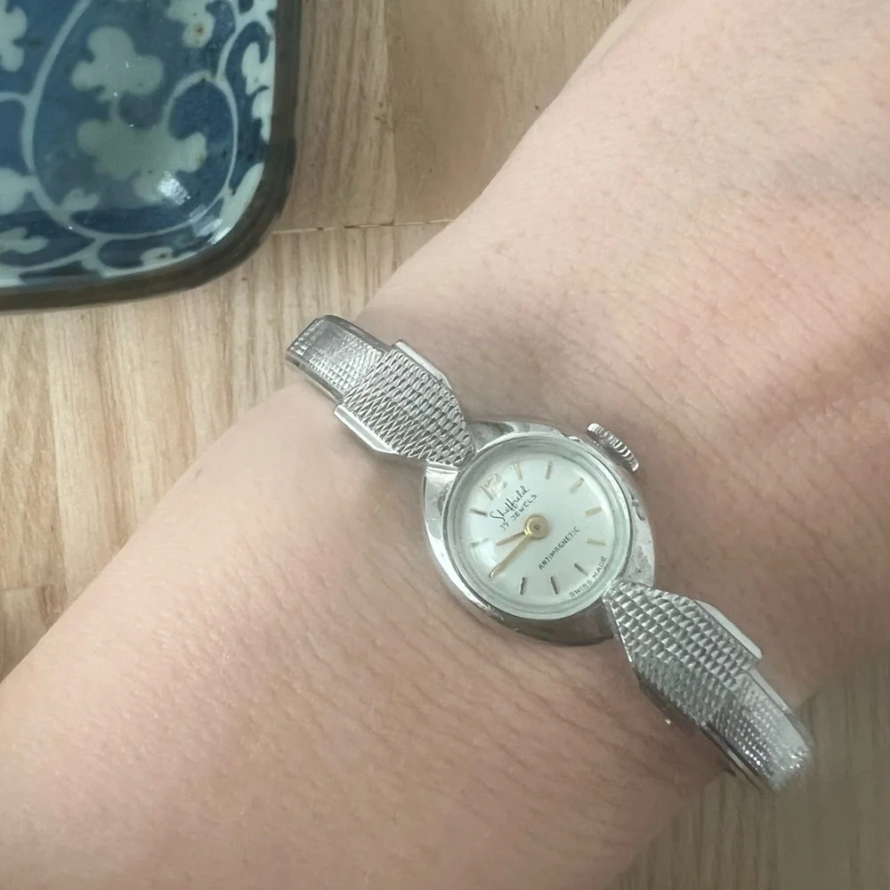 Vintage Sheffield ladies silver tone hinged cuff bracelet mechanical watch